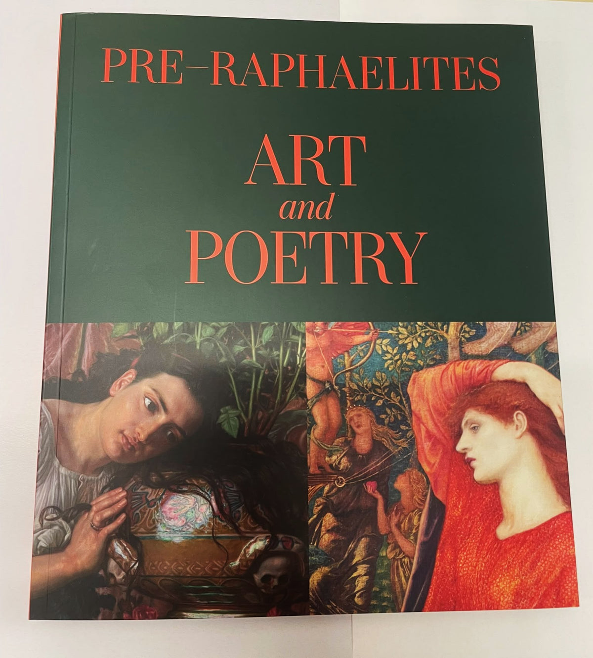 Book titled 'PRE-RAPHAELITES ART and POETRY' with a dark green cover and two paintings along the bottom, of detail iiof Laus Veneris and Isabella and the pot of basil.