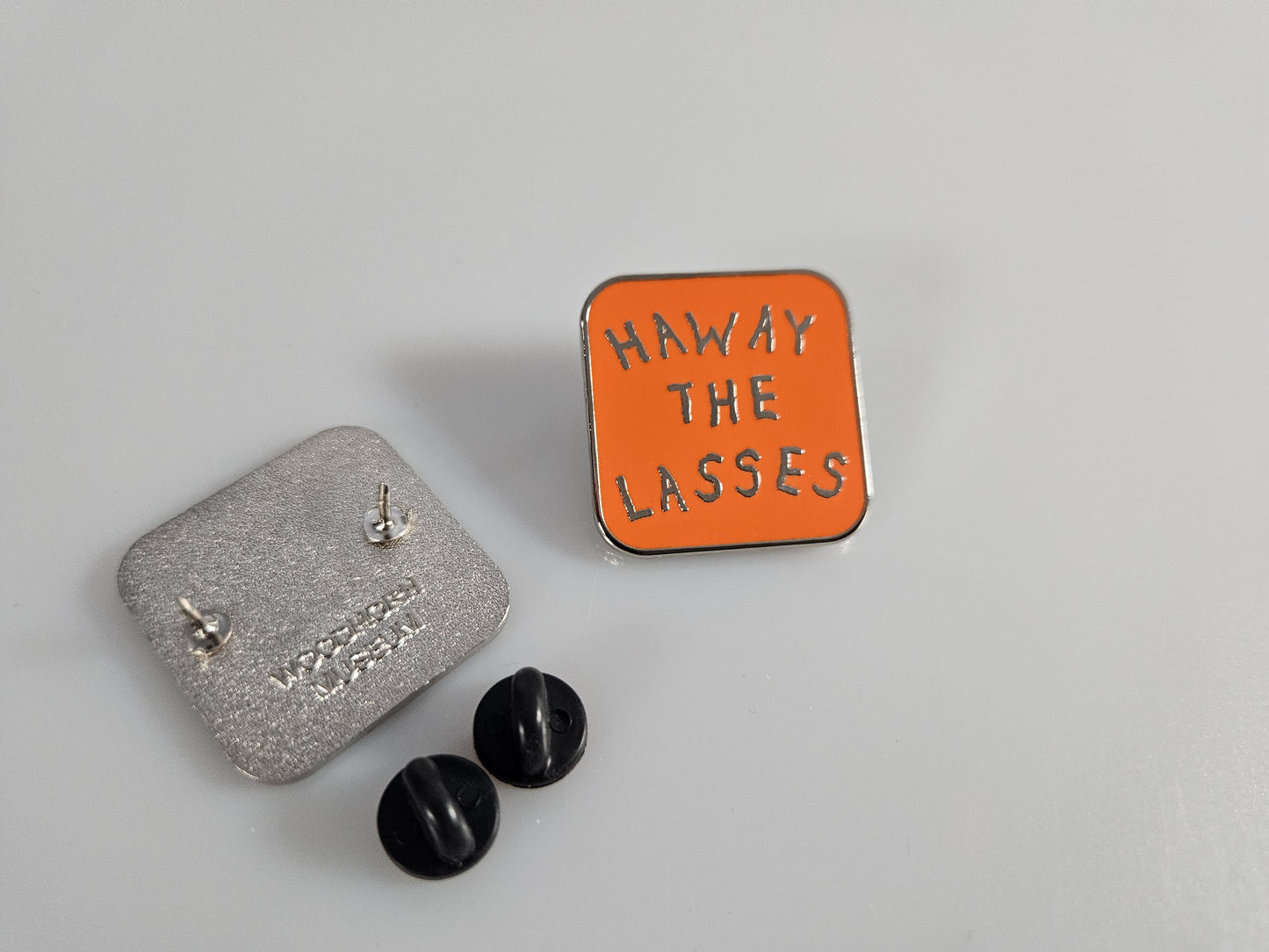 Pin Orange Haway the Lasses