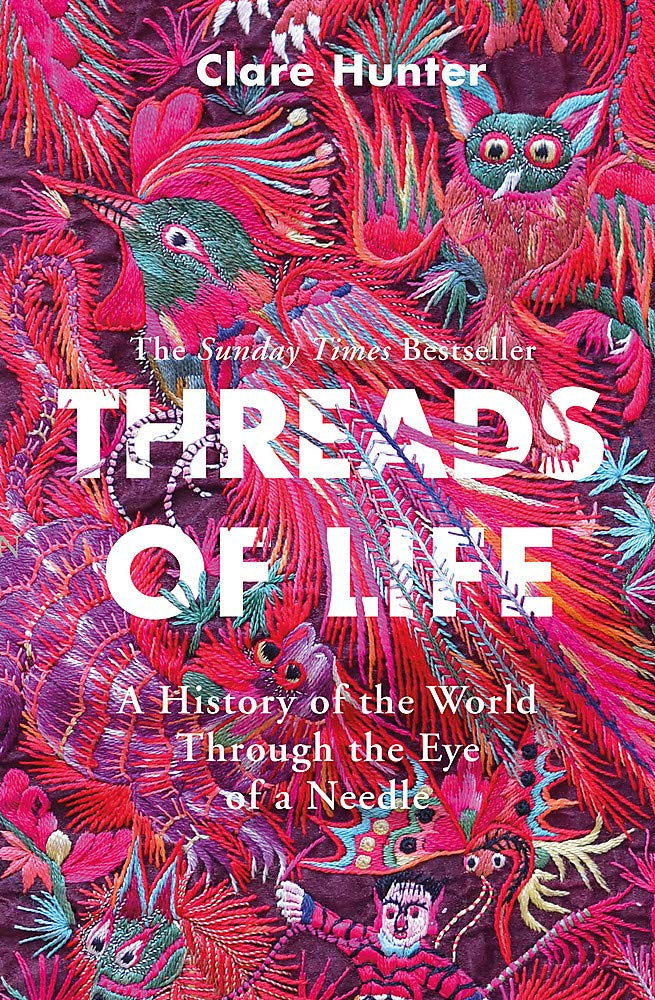 Book cover of 'Threads of Life' by Clare Hunter with colorful patterns and text.