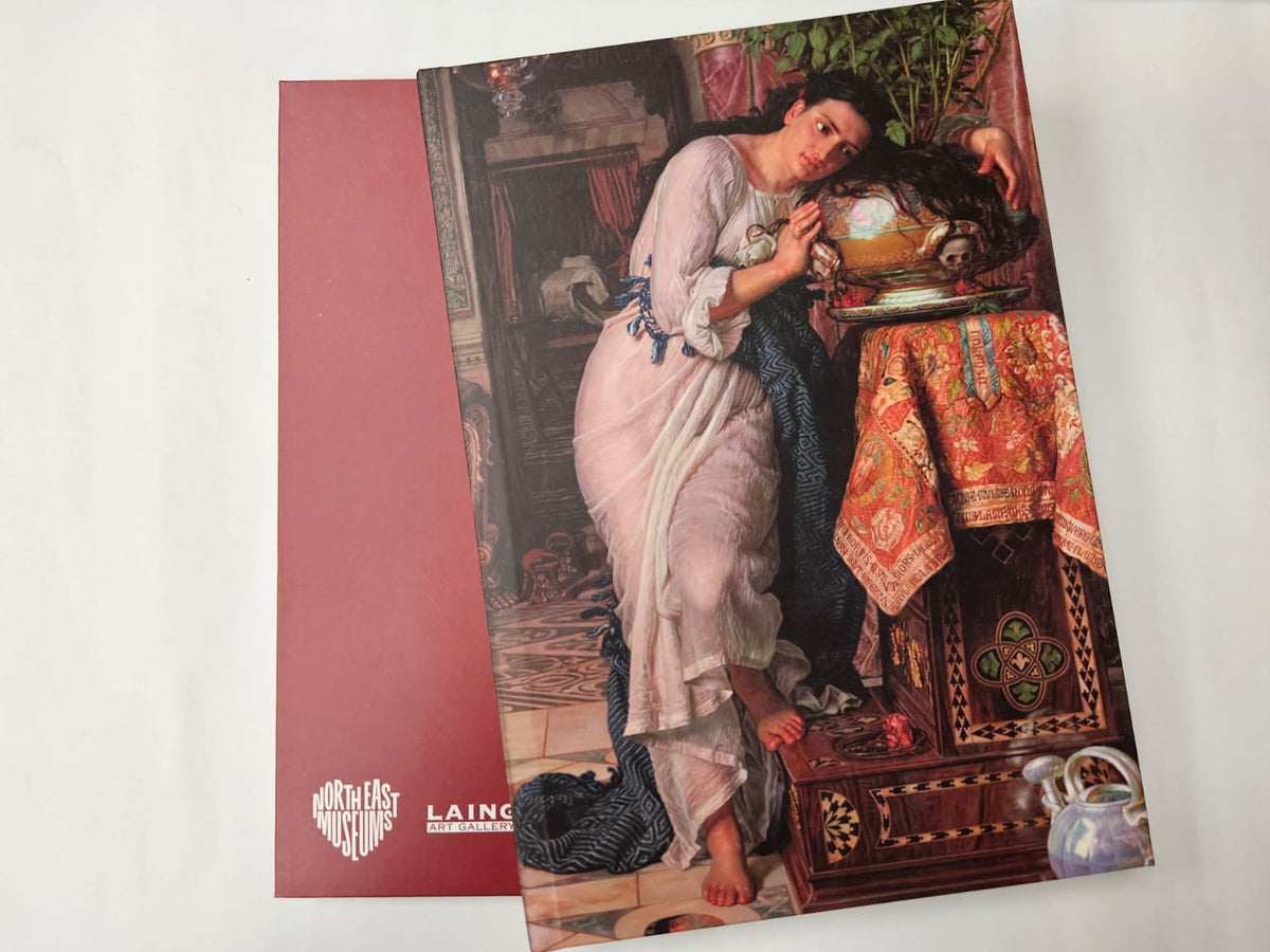 Image of Isabella and the pot of Basil which featuring a woman in a pale dress beside a table with ornate textiles and a pot with basil plant. 